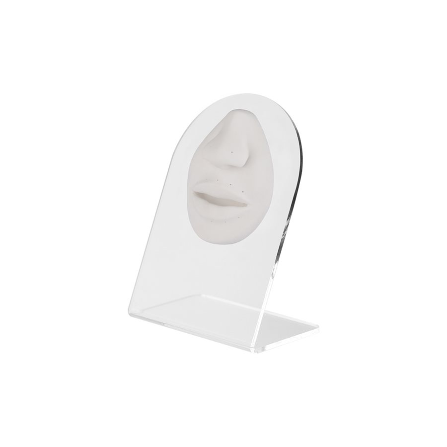 White tattooable nose and lips display on acrylic stand